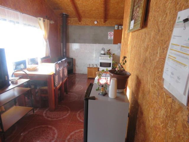 Hostal Y Cabanas Peumayen Пуэрто-Гуадаль Экстерьер фото